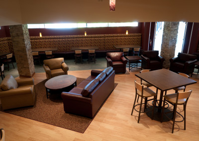 Coe College Campus Pub Lounge Seating with Coffee Tables
