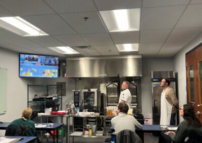 Rational CookingLive Event - attendees are watching video about equipment