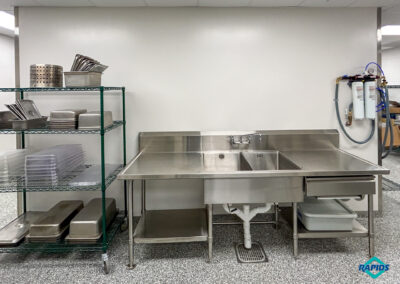 St. Joan of Arc project - Prep Area: 2 Compartment Kitchen Sink, Epoxy Shelving