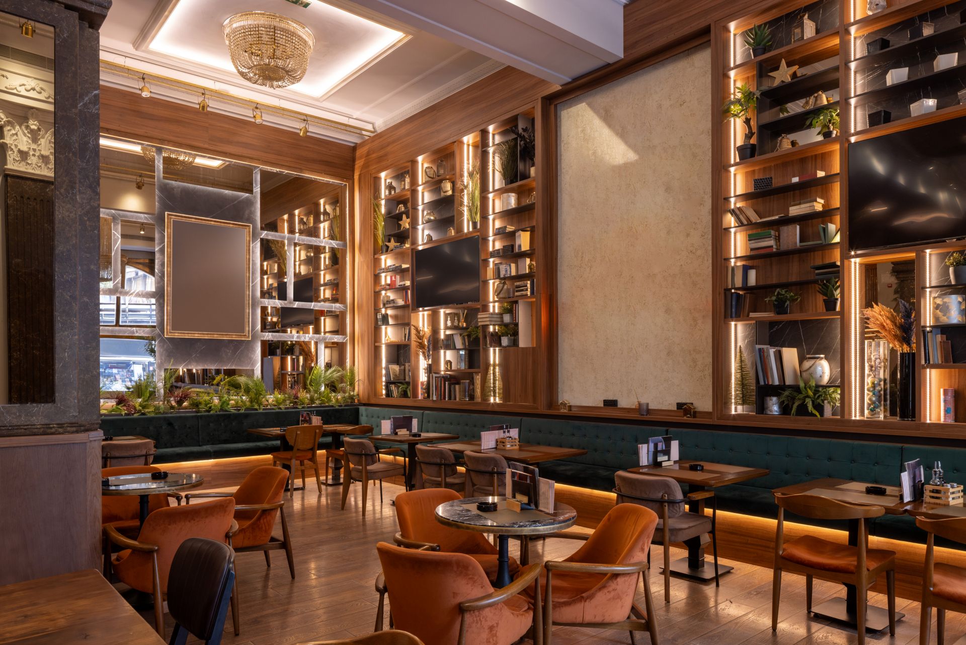 Coffee shop with modern design, velvet seating, and wooden accents