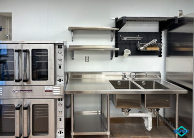 Prep Area: Prep Table with Sinks, Double Stack Southbend Oven